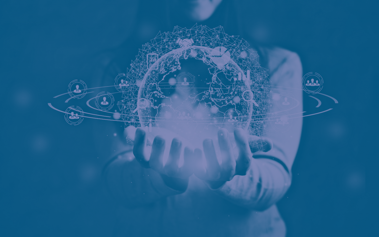 Person holding digital globe in hands